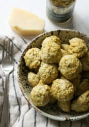 Pesto Meatballs in a stineware bowl.