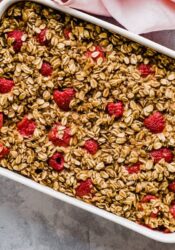 Raspberry baked oatmeal in a pan.