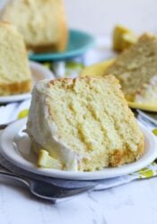 A slice of lemon chiffon cake on a plate.